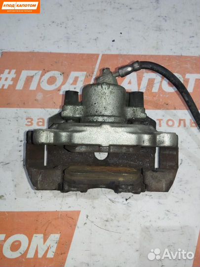 Суппорт тормозной передний правый Volkswagen Caddy