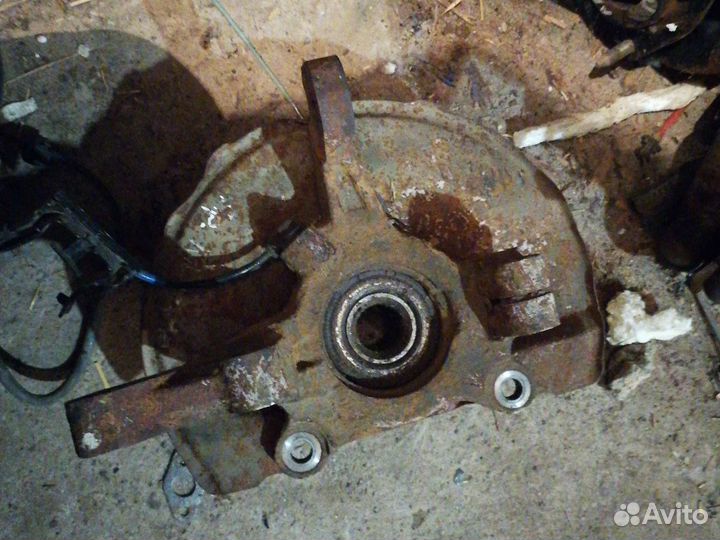 Кулак поворотный mitsubishi lancer 10