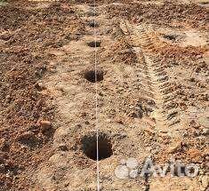 Бурение лунок под столбы