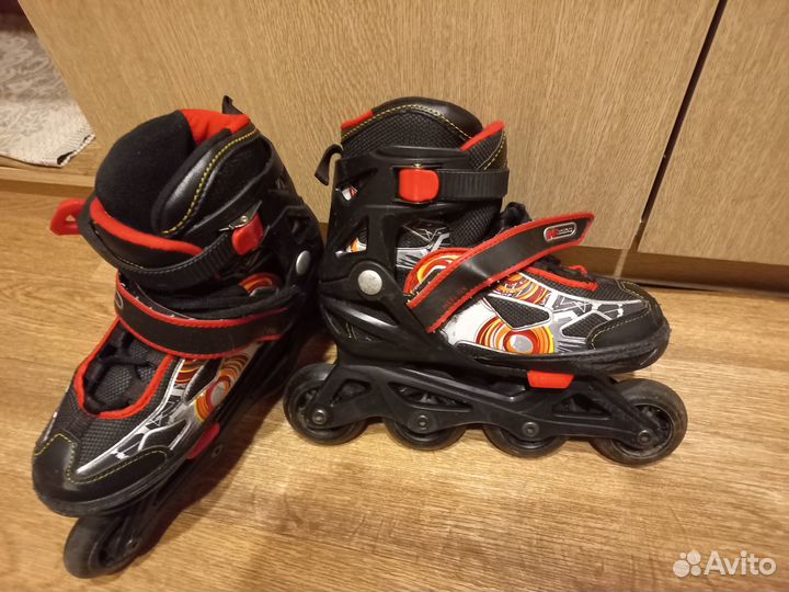 Роликовые коньки