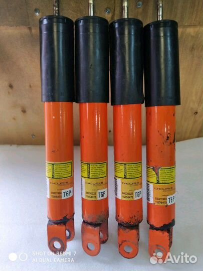 Амортизатор перед Cadillac Escalade Tahoe 2