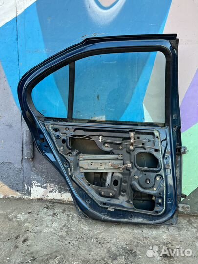 Дверь задняя левая Nissan Primera P11