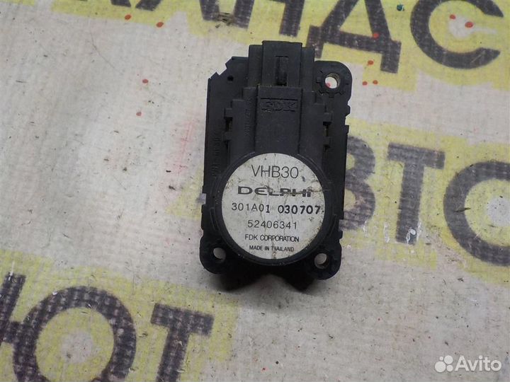 Моторчик заслонки печки Opel Astra H 2004-2014