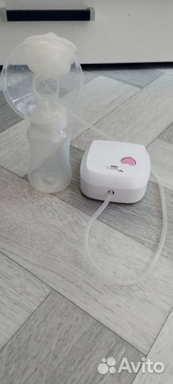 Молокоотсос электрический