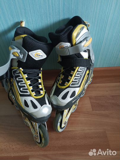 Роликовые коньки