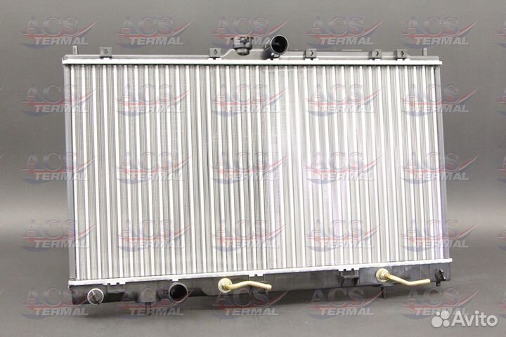 Радиатор охлаждения Mitsubishi Lancer 9