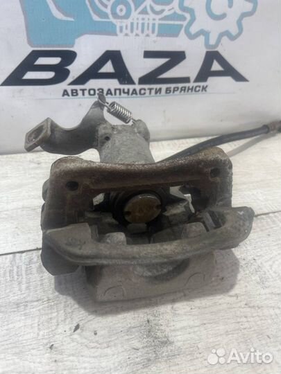 Суппорт задний левый Kia Cerato 3