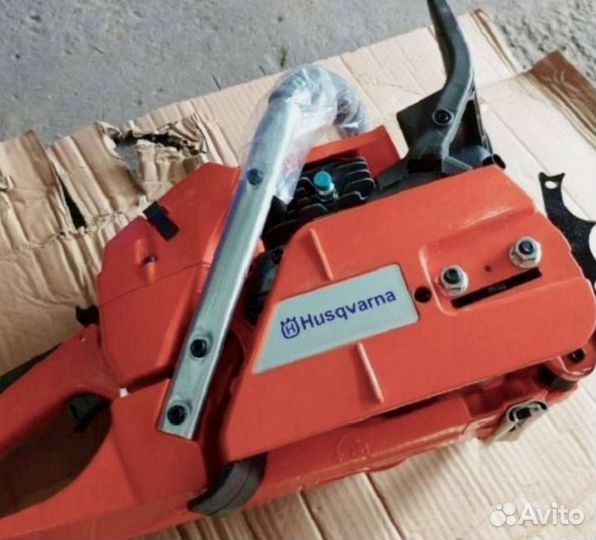 Бензиновая пила Husqvarna с шиной и цепьюю
