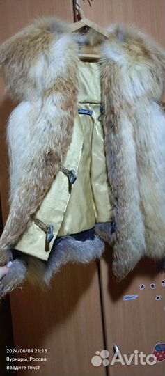 Жилетка меховая женская