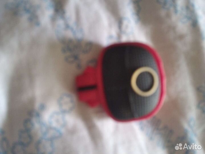 Фигурка из игры кальмара круг