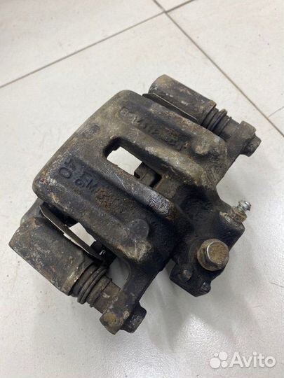 Суппорт тормозной задний левый Chevrolet Captiva