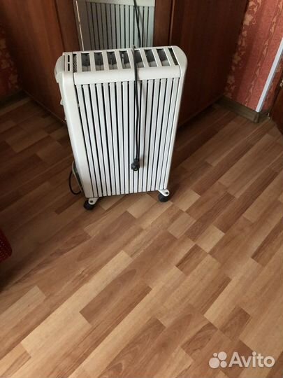 Масляный обогреватель delonghi