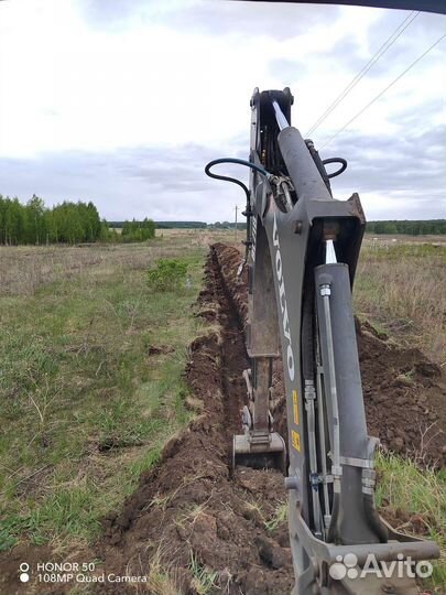 Экскаватор погрузчик в аренду