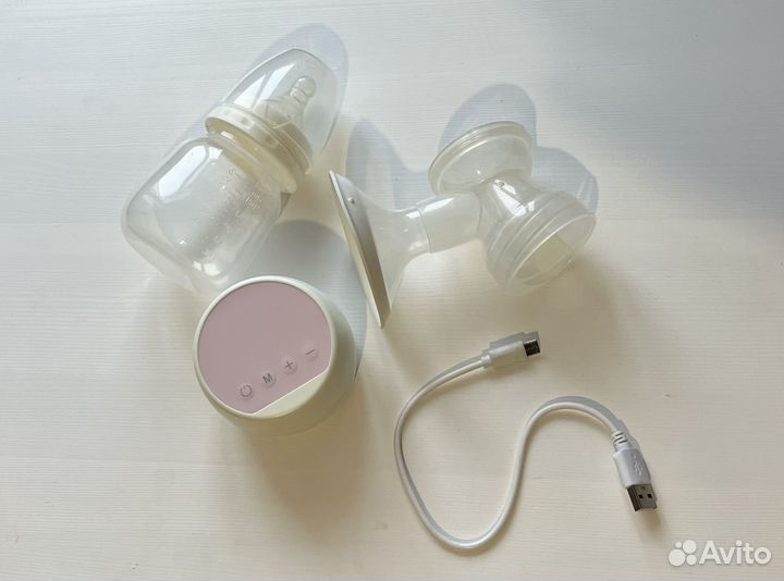 Электрический молокоотсос