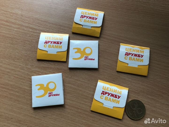 Монеты Макдональдс 30 лет разные