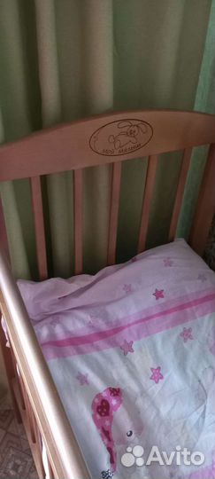 Детская кроватка с поперечным маятником