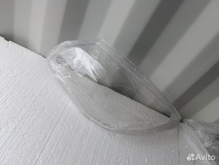 Стекло фары левое / правое Nissan Tiida 2008-2012