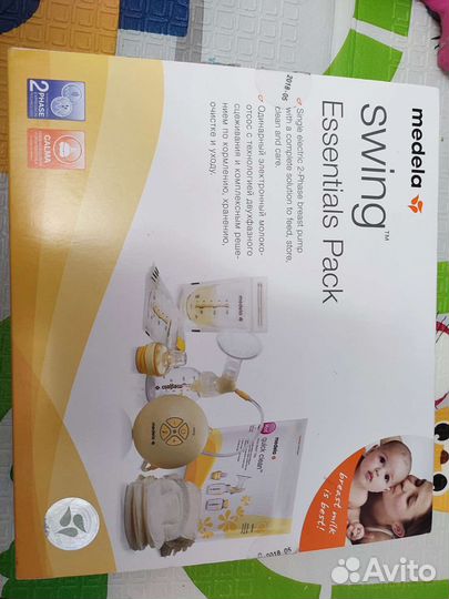 Молокоотсос medela электрический