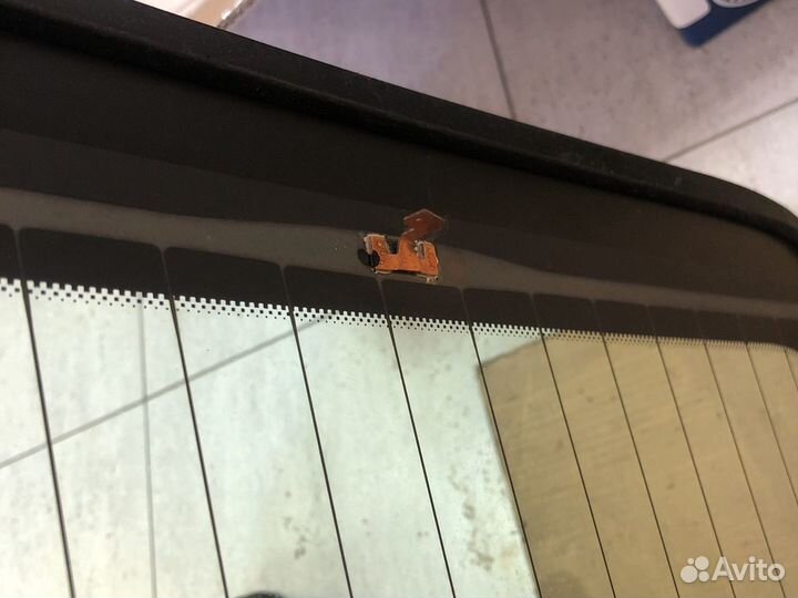 Стекло заднее Opel Astra J