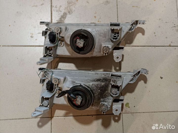 Фара Toyota Carina ST215