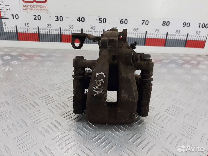 Суппорт задний правый Opel Combo 3 (C) рест. 2004