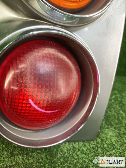 Фонарь задний левый nissan march