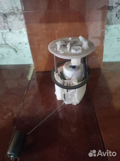 Бензонасос Mitsubishi Lancer 10