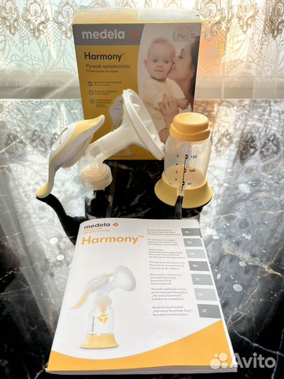 Молокоотсос medela + набор