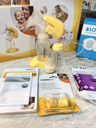 Молокоотсос medela электрический