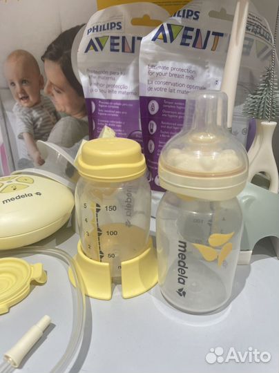 Молокоотсос medela электрический swing flex