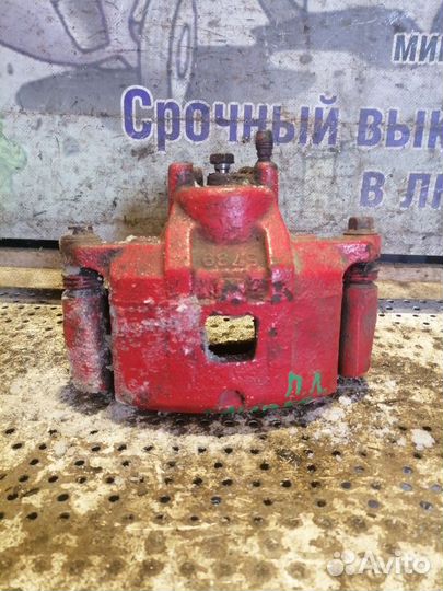 Суппорт тормозной передний левый Dodge Caliber