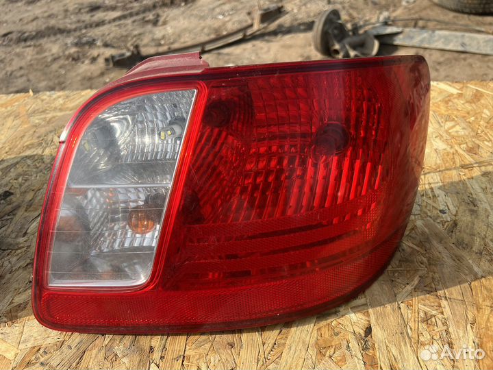 Фонарь правый оригинал kia rio 2