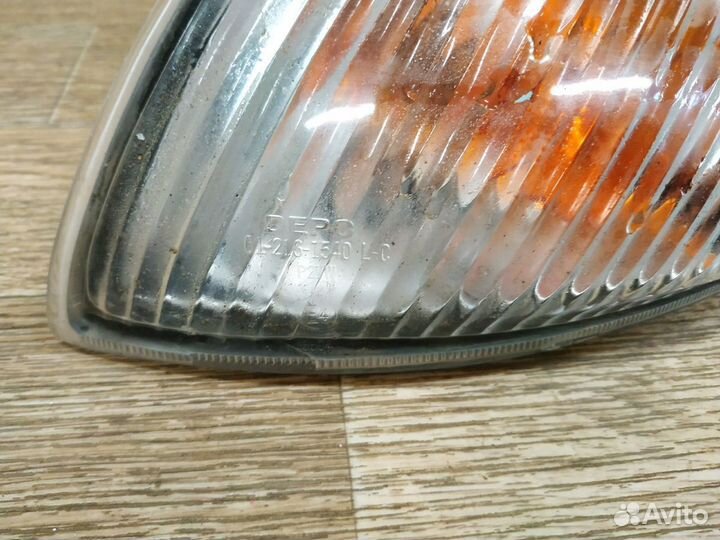 Поворотник фары левый Mazda Capella 626 GF