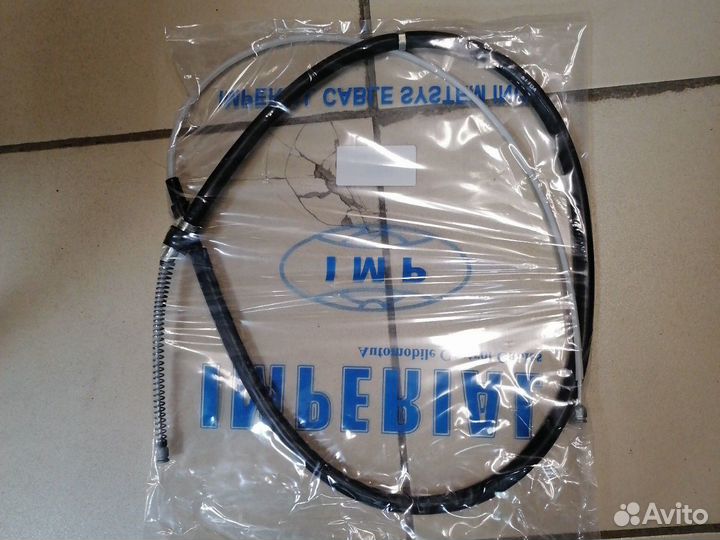 Трос ручника VW Polo седан Skoda Rapid