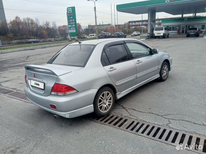 Mitsubishi Lancer 1.6 МТ, 2006, 306 000 км