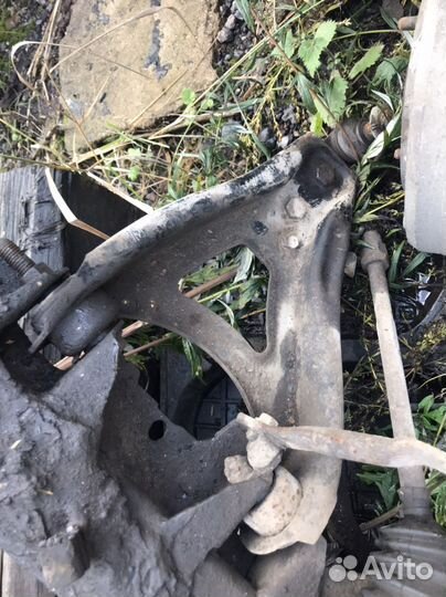 Рычаг левый/правый Renault Megane 1