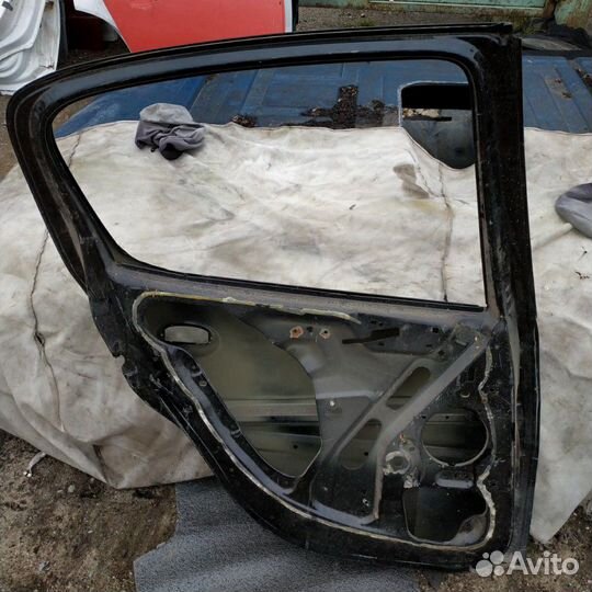 Дверь Peugeot 206