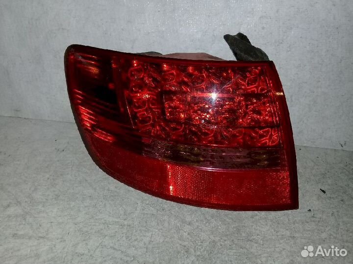 Фонарь (стоп сигнал) задний левый 4F9.945.095B лев