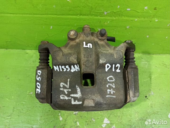 Суппорт тормозной передний левый Nissan Primera