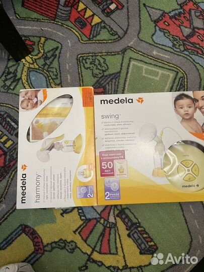 Молокоотсос Medela Swing и Medela Harmony