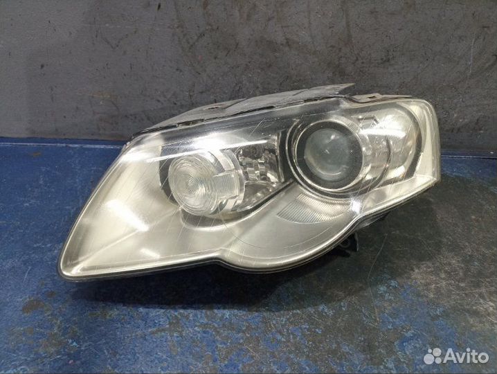 Фара ксенон левая Volkswagen Passat B6