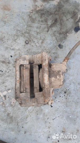 Суппорт тормозной передний левый Renault Logan