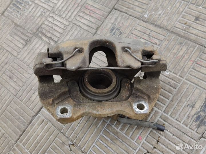 Суппорт передний левый Opel Astra H