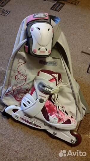 Роликовые коньки