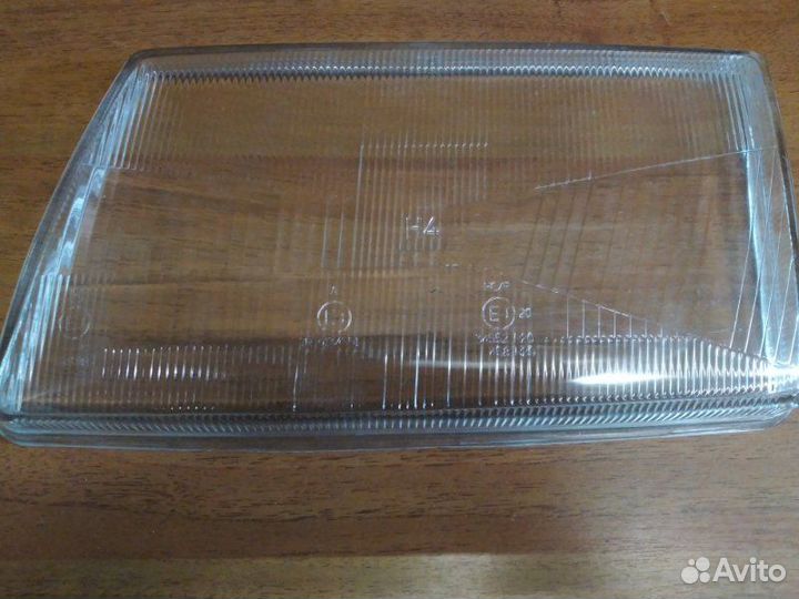 Стекло фары левое Audi 100 1991 - 1995