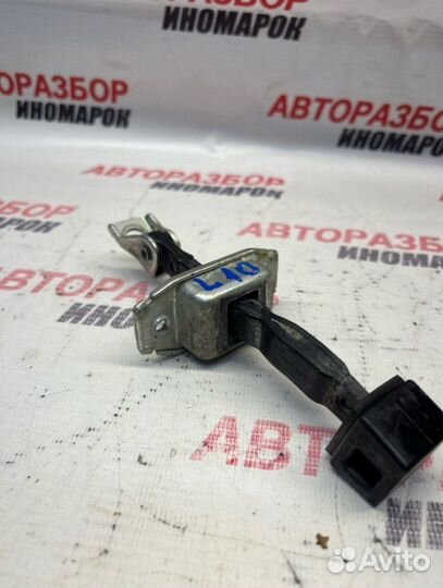 Ограничитель двери задний Mitsubishi Lancer 10 CX