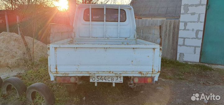 Nissan Atlas бортовой, 1989