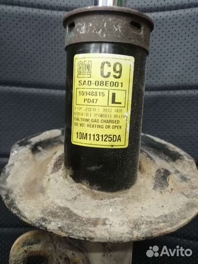 Стойка амортизатора опель антара левая