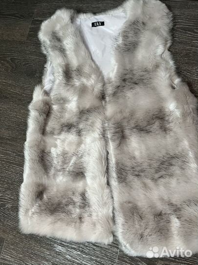 Жилетка женская