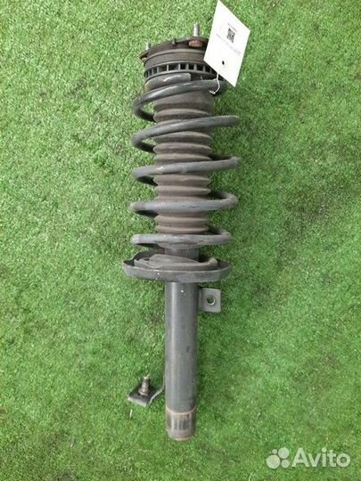 Амортизатор подвески передний левый Mazda Demio